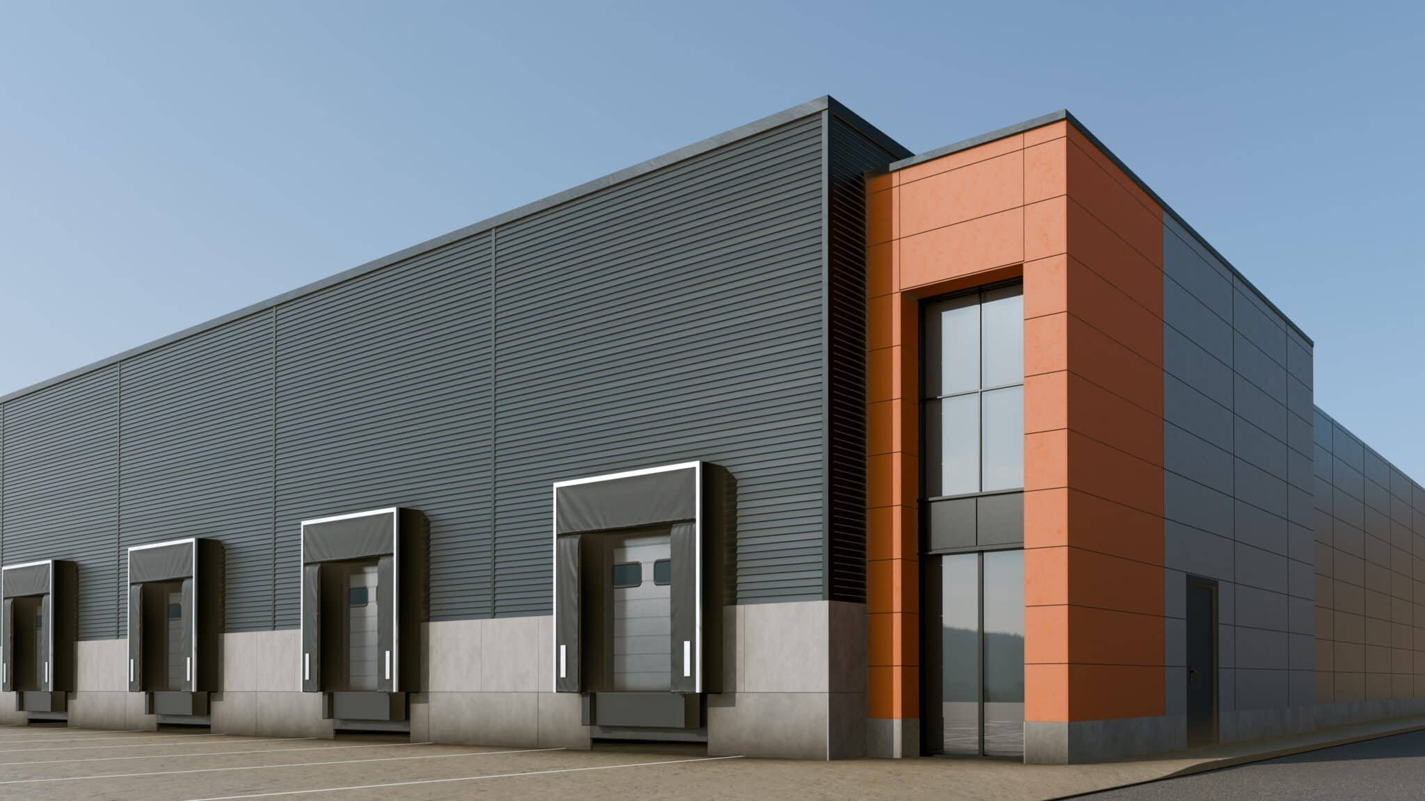 Modern,Industrial,Warehouse,With,Loading,Docks,And,Orange,Office,Facade